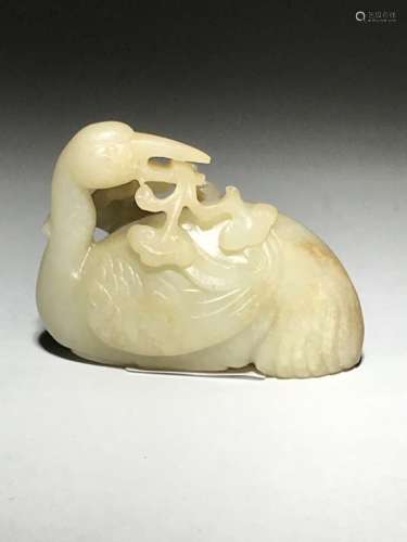 A Carved White Jade Bird with Ganoderma
