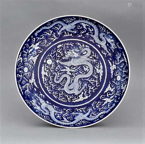 DAOGUANG REVERSED BLUE GLAZED DRAGON CHARGER