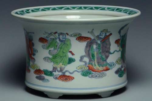 A QING DYNASTY DOUCAI EIGHT IMMORTALS PLANTER