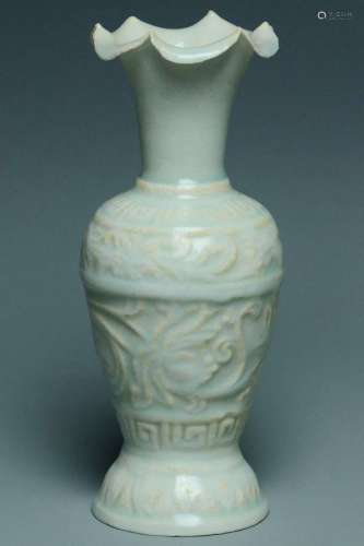 A CARVED QINGBAI FLORAL VASE