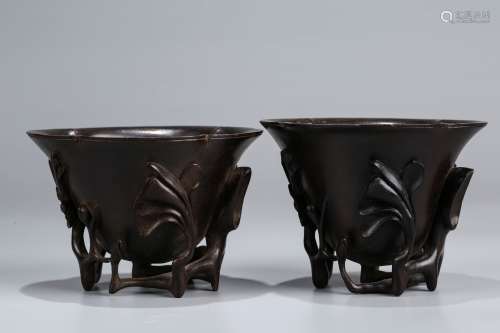 A Set of Two Chinese Carved Hard Wood Cups