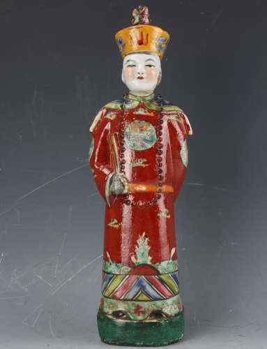 A porcelain figure of Chinese Emeror
