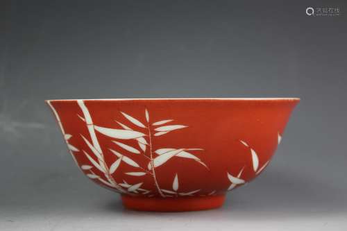 Chinese Fencai coral red glazed porcelain bowl depicting bamboo, Qianlong mark