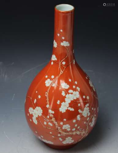 Chinese coral red glazed porcelain vase with gold rim depicting plum blossoms, Qianlong mark