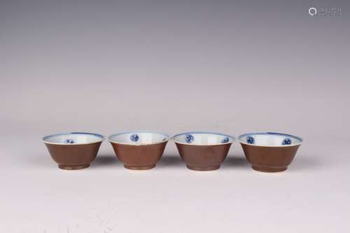 A  GROUP OF BROWN GLAZED TEA CUPS