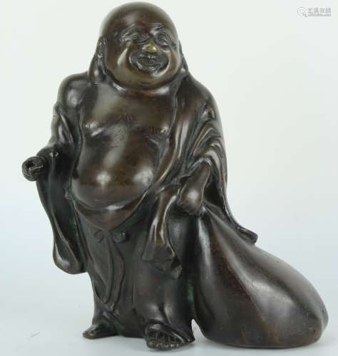 Japanese bronze figure of Hotei god dragging a bag