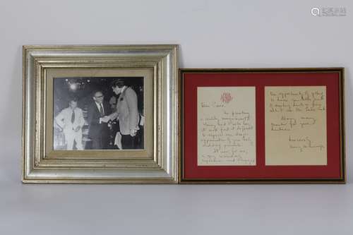 Framed photo of Henry Kissinger and a letter by his wife