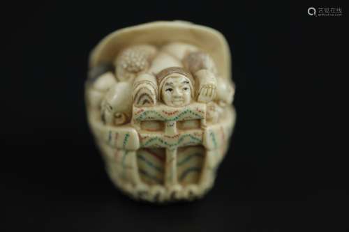 Vintage Netsuke carving of a Seven Gods of luck and Fortune on a boat