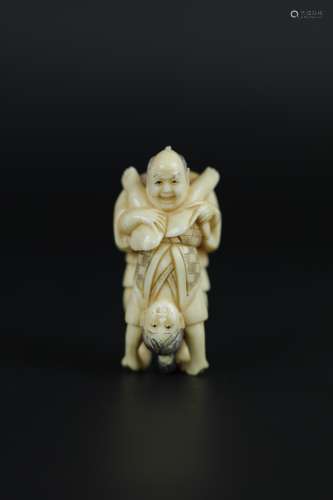 Vintage Netsuke carving of man and woman having oral pleasure erotic