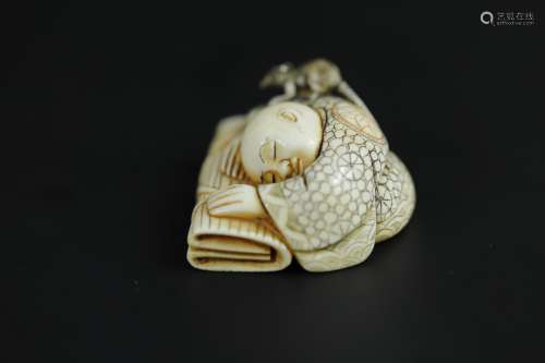 Vintage Netsuke carving of a scholar sleeping with a rat on his shoulder