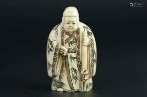 Vintage Netsuke carving of a elderly couple