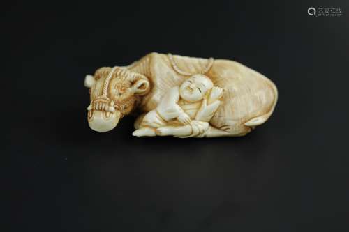 Vintage Netsuke carving of a boy and his ox