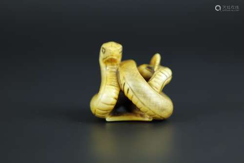 Vintage Netsuke carving of a snake