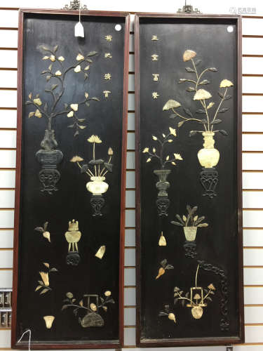 A pair of hardwood hanging screen set with jade