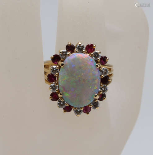 Opal 14k ring beset with diamond and ruby