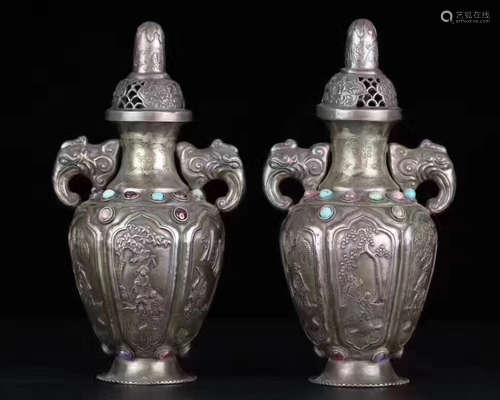 QING DYNASTY PAIR OF ELEPHANT-HEAD SHAPED VASES