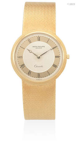 Calatrava, Ref: 3744/1, Circa 1980  Patek Philippe. An 18K gold quartz bracelet watch