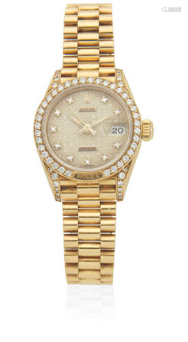 Datejust, Ref: 69158, Circa 1986  Rolex. A lady's 18K gold diamond set automatic calendar bracelet watch