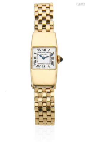 Circa 1930  Cartier. A lady's early 18K gold manual wind rectangular bracelet watch