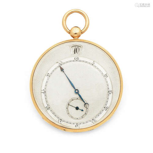 Circa 1825  A slim gold key wind open face pocket watch with eccentric jump hour dial