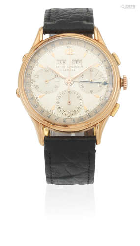 Circa 1950  Baume & Mercier. An 18K gold manual wind triple calendar chronograph wristwatch