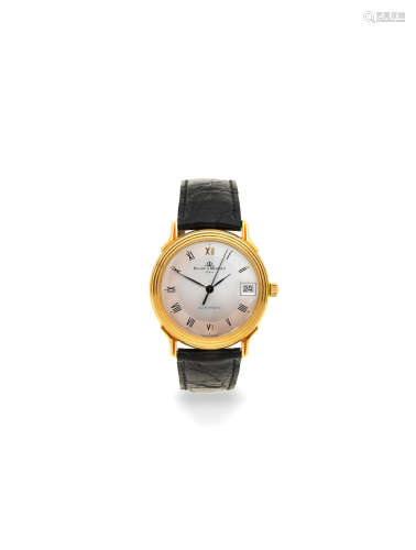 Ref: 35264, Circa 1990  Baume & Mercier. An 18K gold automatic calendar wristwatch