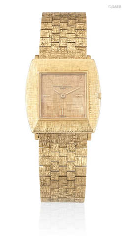 Ref: 6712, Circa 1970  Vacheron & Constantin. An 18K gold manual wind tonneau form bracelet watch