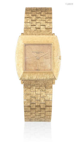Ref: 6712, Circa 1970  Vacheron & Constantin. An 18K gold manual wind tonneau form bracelet watch