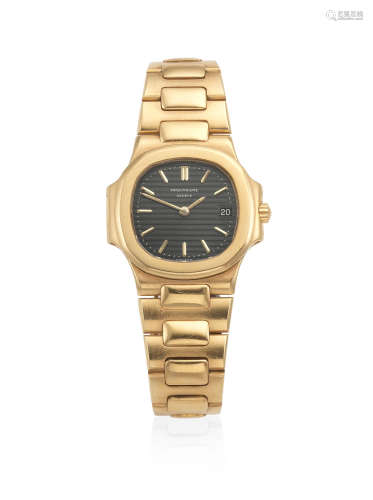 Nautilus, Ref: 4700/1, Circa 1985  Patek Philippe. A lady's 18K gold quartz calendar bracelet watch