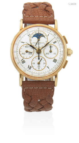 Circa 1990  Baume & Mercier. An 18K gold manual wind chronograph wristwatch with moon phase