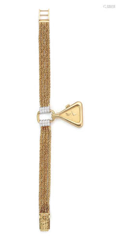 Ref: 5109 1, Circa 1980  Chopard for Kutchinsky. A lady's unusual form 18K gold and diamond set manual wind pendant bracelet watch