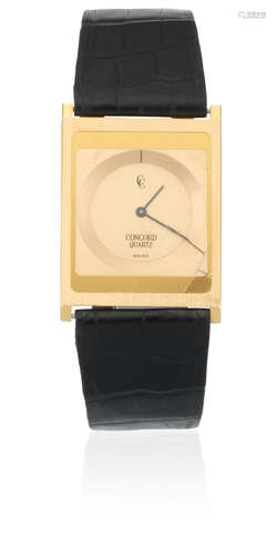 Circa 1990  Concord. An 18K gold ultra-thin quartz rectangular wristwatch