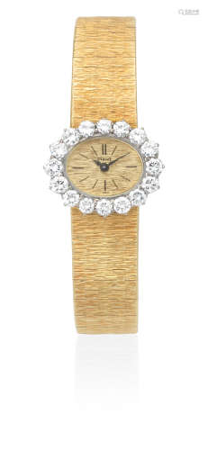 Ref: 3867 A6, Circa 1980  Piaget. A lady's 18K gold and diamond set manual wind bracelet watch