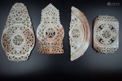 FOUR JADE OPENWORK CARVED 'MYTHICAL BEASTS' DISCS