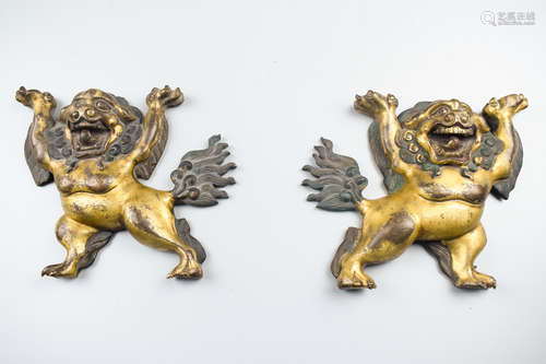 PAIR OF GILT BRONZE 'LIONS' PLAQUES