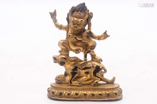 GILT BRONZE CAST WRATHFUL DEITY FIGURE