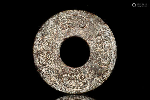 ARCHAIC JADE BI DISC WITH UNUSUAL SYMBOLS