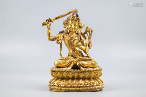 GILT BRONZE CAST MANJUSHRI SEATED FIGURE