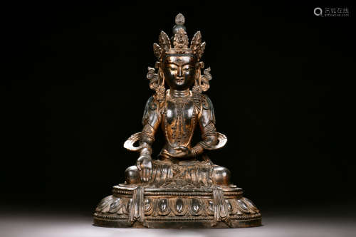 RED COPPER AND SPLASH GILT SEATED GUANYIN FIGURE