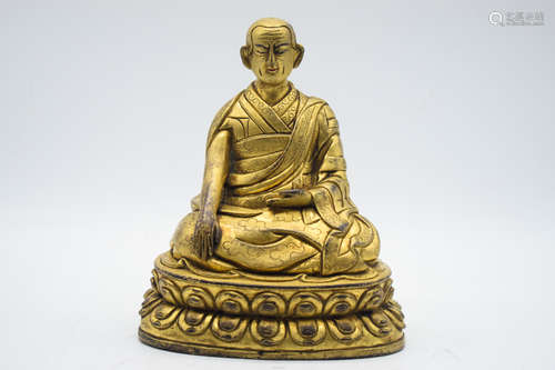 GILT BRONZE CAST 'LAMA' SEATED FIGURE