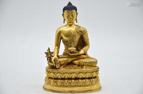 GILT BRONZE CAST BHAISAJYAGURU SEATED FIGURE