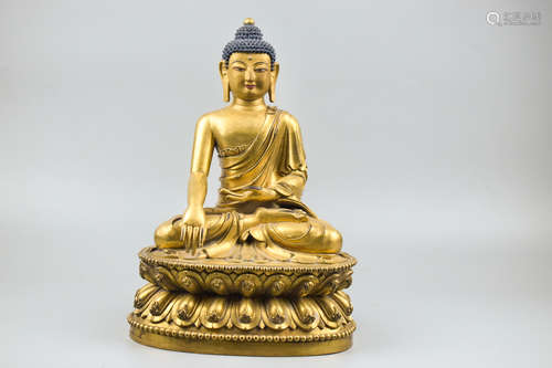 GILT BRONZE CAST SHAKYAMUNI SEATED FIGURE