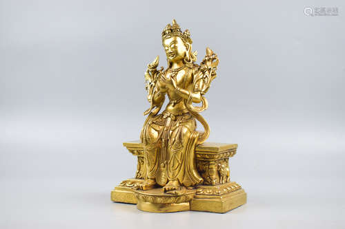 GILT BRONZE CAST MANJUSHRI SEATED FIGURE