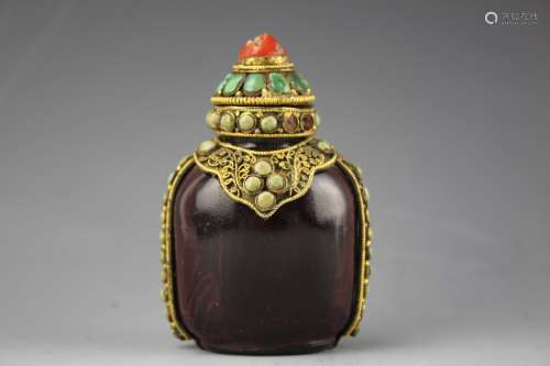 Chinese Peking glass gilt copper with turquoise inlay snuffle bottle with turquoise and coral stopper. 19th century