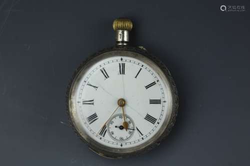 Vintage carved sterling silver pocket watch with white dial and gild hands .  No movements