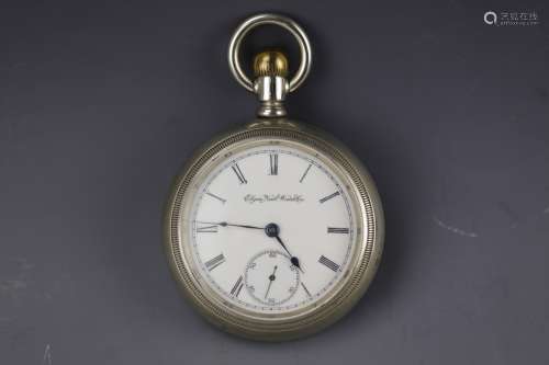 Vintage Elgin National silver pocket watch with white dial and  black Roman numerals. No movements.