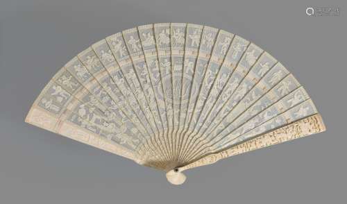 Ω A Chinese ivory monogrammed brise fan, Canton, circa 1820, carved on one side with interlaced