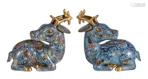 A pair of Chinese cloisonnÃ© deer censers and covers, each recumbent and facing to the left or