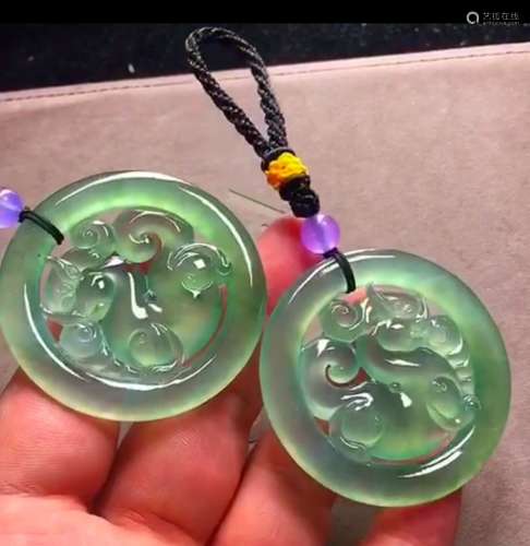 large pair of Icy soft green Jadeite pendant