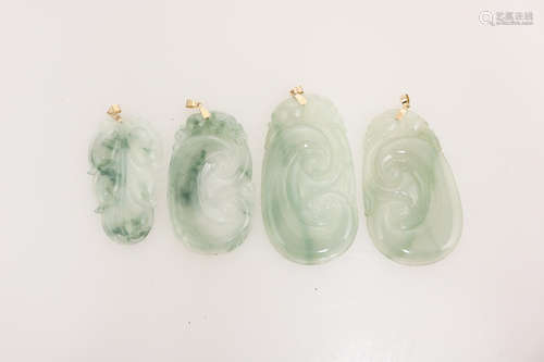 FOUR CERTIFICATED JADEITE PENDANTS